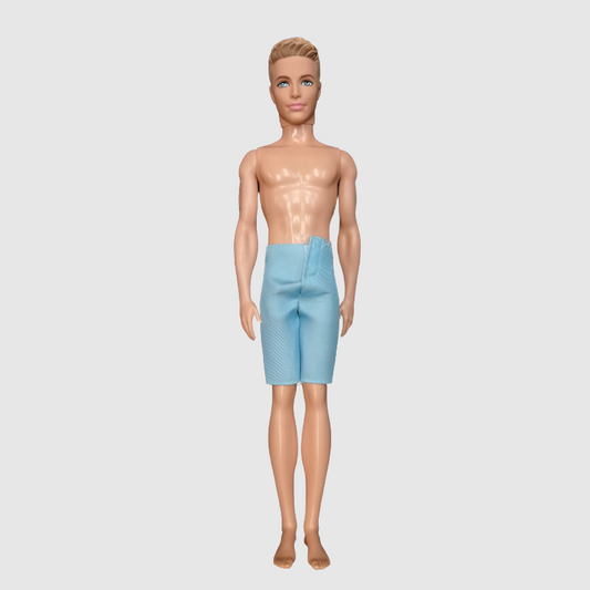 Figura de colección Ken Pelo Rubio pantalón azul